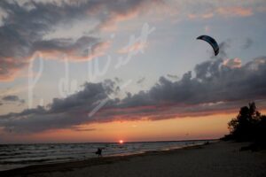 "Go Fly a Kite: Sunset at the Beach" - Peggy deWitt