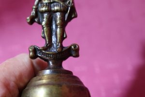 Alternative view of Sir Walter Raleigh Brass Bell - England