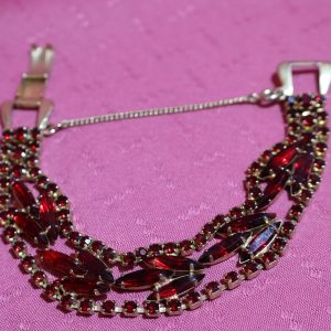 Mid Century Red Rhinestone triple strand on gold bracelet